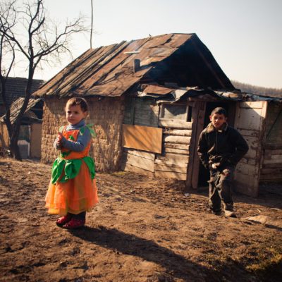 serednie-ukraine-march-09-2011-romani-boy-and-little-girl-in-orange-pumpkin-style-dress-over-clothes_t20_dzoxaJ.jpg